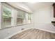 Bright breakfast nook featuring fresh paint, laminate flooring, and natural light at 1523 Pangborn Station Dr, Decatur, GA 30033