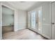 The home foyer features new flooring, modern paint, and a decorative glass front door at 1523 Pangborn Station Dr, Decatur, GA 30033