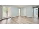 Bright living room featuring wood flooring and French doors leading to the outside at 1523 Pangborn Station Dr, Decatur, GA 30033