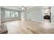Open living room featuring natural light, neutral walls, and light wood laminate flooring at 1523 Pangborn Station Dr, Decatur, GA 30033