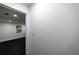Basement hallway with window and carpet, providing a bright and inviting transition between spaces at 4 Bentley Trace Mnr, Atlanta, GA 30327