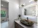 Bathroom vanity features a stylish vessel sink, and large light-up mirror at 4 Bentley Trace Mnr, Atlanta, GA 30327