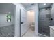 Bathroom with tiled shower and wood-look tile flooring at 4 Bentley Trace Mnr, Atlanta, GA 30327