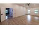 Spacious bedroom featuring hardwood floors, high ceilings, and an en suite bathroom at 4 Bentley Trace Mnr, Atlanta, GA 30327