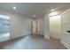 Spacious bedroom featuring plush carpeting with easy access to ensuite bathroom and hallway at 4 Bentley Trace Mnr, Atlanta, GA 30327