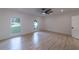 Spacious bedroom with hardwood floors and great natural light from the two windows at 4 Bentley Trace Mnr, Atlanta, GA 30327