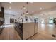 Gourmet kitchen with a large island, modern appliances, and open layout connecting to the dining and living areas at 4 Bentley Trace Mnr, Atlanta, GA 30327