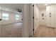 View from the doorway showing the laundry room and the entrance to the main bedroom at 4 Bentley Trace Mnr, Atlanta, GA 30327