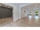 Spacious living area featuring hardwood floors, neutral paint, and an adjacent study at 4 Bentley Trace Mnr, Atlanta, GA 30327