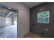 Mudroom/laundry area with access to the garage at 4 Bentley Trace Mnr, Atlanta, GA 30327