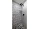 Close-up of tiled shower with black fixtures at 4 Bentley Trace Mnr, Atlanta, GA 30327