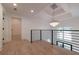 Beautiful upstairs landing with chandelier, hardwood floors, and lots of light at 4 Bentley Trace Mnr, Atlanta, GA 30327