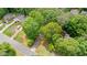 An aerial view of a secluded lot surrounded by lush greenery and mature trees at 4771 Pinefield Nw Dr, Acworth, GA 30102