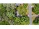 Aerial view of the home nestled among lush trees, showcasing its location and surrounding greenery at 4771 Pinefield Nw Dr, Acworth, GA 30102