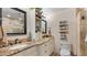 Beautiful bathroom features double sinks with granite countertops and matching framed mirrors at 4771 Pinefield Nw Dr, Acworth, GA 30102