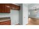 Kitchen area with wood cabinets and eat in area at 4771 Pinefield Nw Dr, Acworth, GA 30102