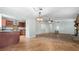 Open-concept kitchen with stainless steel appliances and wooden cabinets at 4771 Pinefield Nw Dr, Acworth, GA 30102