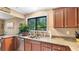 Functional kitchen featuring modern appliances, generous counter space, and a delightful view of the outdoors at 4771 Pinefield Nw Dr, Acworth, GA 30102