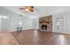 Spacious living room with stone fireplace and plenty of natural light at 4771 Pinefield Nw Dr, Acworth, GA 30102