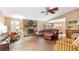 Spacious living room showcasing a stone fireplace, comfortable furniture, and natural light for a cozy ambiance at 4771 Pinefield Nw Dr, Acworth, GA 30102