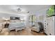 Main bedroom with elegant decor, ceiling fan, and wood floors creating a relaxing retreat at 4771 Pinefield Nw Dr, Acworth, GA 30102