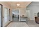 Elegant foyer featuring modern flooring, light gray walls and a view of the living space at 1550 Misty Valley Dr, Lawrenceville, GA 30045