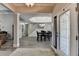 Open foyer with a view of the staircase, dining area and decorative front door at 1550 Misty Valley Dr, Lawrenceville, GA 30045