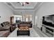 Open-concept layout with living room, dining area, and hallway with high ceilings at 1550 Misty Valley Dr, Lawrenceville, GA 30045