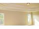 Bedroom with high ceilings, large windows and neutral paint at 3670 Kissell Dr, Cumming, GA 30041