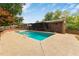 Enjoy the outdoors in this expansive backyard with a refreshing swimming pool and lush landscaping at 3916 Green Forest Se Ln, Smyrna, GA 30082