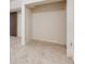 Unfinished basement with tiled floors, white walls, and access to storage space at 3916 Green Forest Se Ln, Smyrna, GA 30082