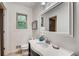 Bright bathroom with a stylish vanity, decorative mirror, and contemporary fixtures create a spa-like ambiance at 3916 Green Forest Se Ln, Smyrna, GA 30082