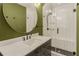 Stylish bathroom featuring quartz countertops, new vanity, modern mirror, and glass-enclosed shower at 3916 Green Forest Se Ln, Smyrna, GA 30082
