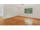 Elegant dining area with hardwood floors and a modern light fixture at 3916 Green Forest Se Ln, Smyrna, GA 30082