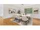 Dining room with a modern table, stylish chairs, and decorative artwork at 3916 Green Forest Se Ln, Smyrna, GA 30082