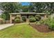 Charming brick home featuring a well-maintained lawn and mature landscaping at 3916 Green Forest Se Ln, Smyrna, GA 30082