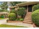 Beautiful brick home with lovely landscaping, brick steps, and a welcoming front entrance at 3916 Green Forest Se Ln, Smyrna, GA 30082