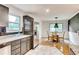 Bright kitchen with breakfast area, stainless steel refrigerator and modern cabinets at 3916 Green Forest Se Ln, Smyrna, GA 30082