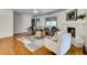 Bright living room features a fireplace, hardwood floors, and stylish decor at 3916 Green Forest Se Ln, Smyrna, GA 30082