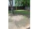 View of the backyard featuring a concrete patio and a wood fence at 615 Waynes Se Ct, Atlanta, GA 30354