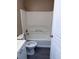 Clean bathroom showcasing a toilet, a shower with a tub, and neutral wall paint at 615 Waynes Se Ct, Atlanta, GA 30354