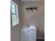 Bathroom featuring vanity with storage, modern lighting and a bright window at 615 Waynes Se Ct, Atlanta, GA 30354