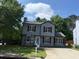 Exterior shot of a two-story home with fresh gray siding at 615 Waynes Se Ct, Atlanta, GA 30354