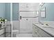Bathroom features a glass enclosed shower, double sinks, and a marble countertop at 1116 United Se Ave, Atlanta, GA 30316