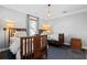 Bedroom with two twin beds, wood floors, and windows that allow in natural light at 1116 United Se Ave, Atlanta, GA 30316