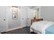 Bedroom with closet, wood floors, and baseboard trim at 1116 United Se Ave, Atlanta, GA 30316