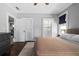 Spacious bedroom featuring large windows, modern blinds, and access to a possible ensuite bathroom at 1116 United Se Ave, Atlanta, GA 30316