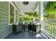 Inviting front porch featuring a comfortable seating area, perfect for relaxation and enjoying the outdoor scenery at 1116 United Se Ave, Atlanta, GA 30316
