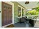 Inviting front porch featuring a comfortable seating area, perfect for relaxation and enjoying the outdoor scenery at 1116 United Se Ave, Atlanta, GA 30316