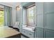Bright home office features custom built-ins, a window seat and modern fixtures at 1116 United Se Ave, Atlanta, GA 30316